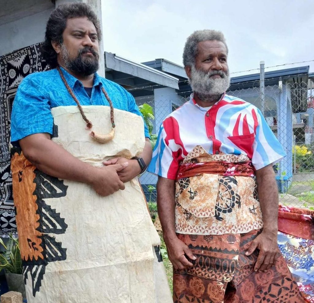 Two itaukei men dressed in traditional attire to show that they observed a taboo period of mourning.